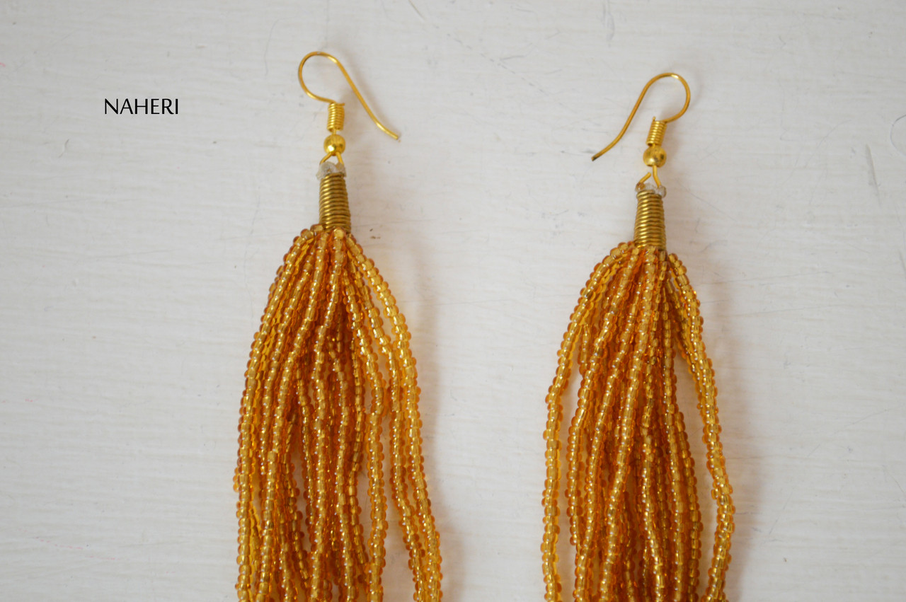 Buy Gold Plated Beads Kundan Tassel Drop Earrings by Just Shradha's Online  at Aza Fashions.